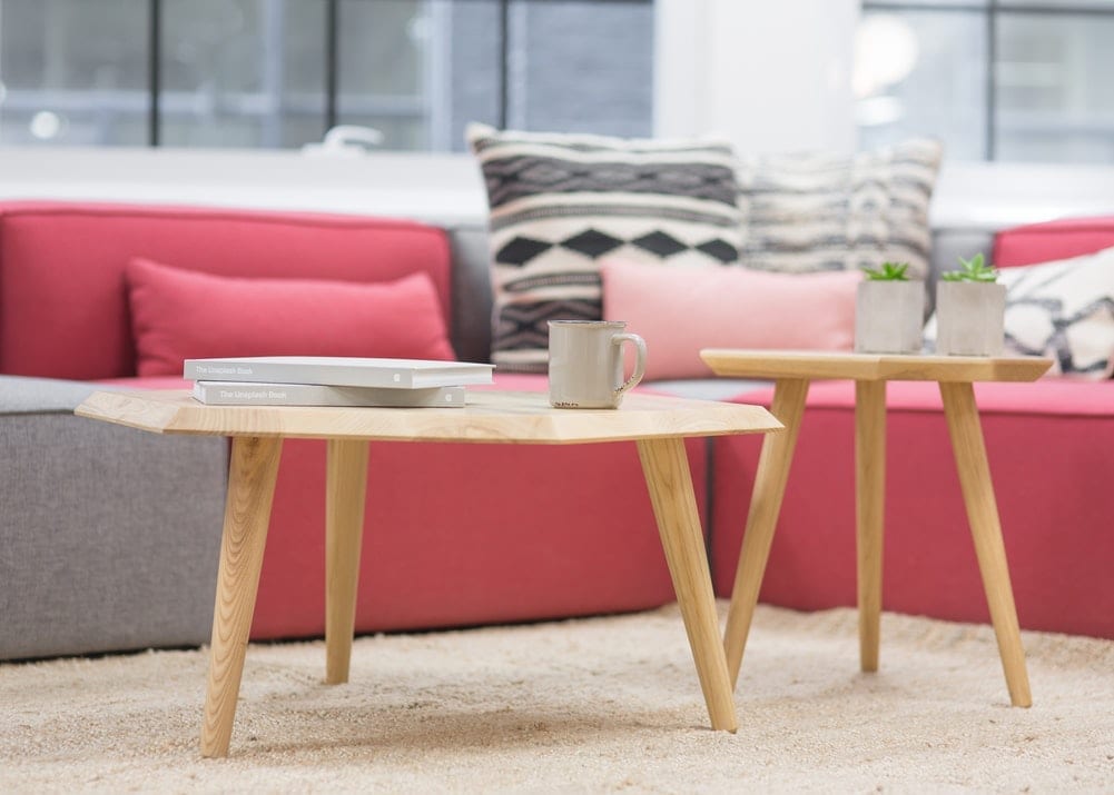 upholstery and small table on rug